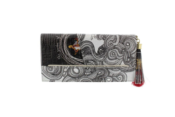 Front side of genuine embossed glossy leather clutch bag white spiral design and garden design. With leather and horsehair assorted tassel.