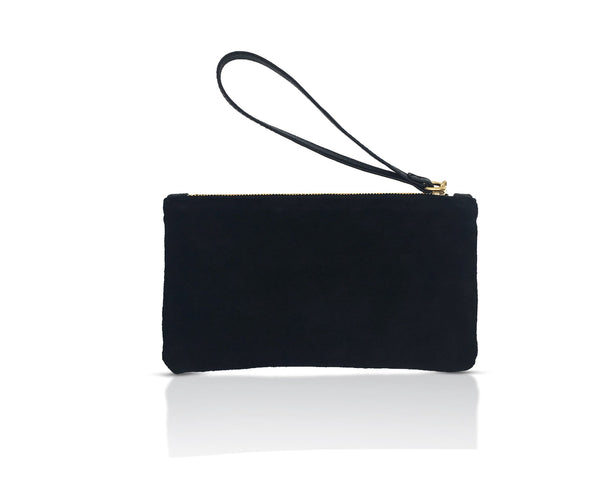 reverse side of the black suede leather pouch with detachable leather wristlet
