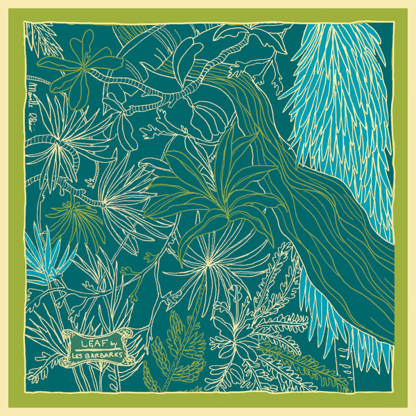 100% silk scarf with blue, green and gold colors. Leaves and trees printed design