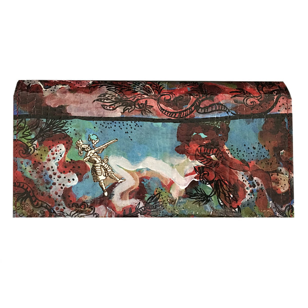 Reverse side of clutch bag showing printed colors and images on glossy croc leather