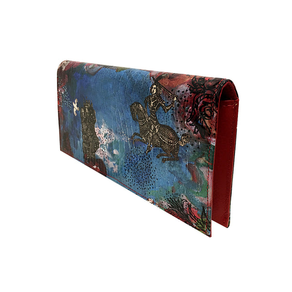 Leather blue glossy croc effect with printed images clutch bag with red leather interior