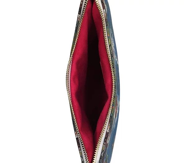 Inside the pouch raspberry red leather lined